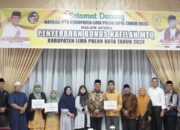 Pemkab Limapuluh Kota Serahkan Bonus Juara Umum MTQ ke-40 Senilai 1,4 Milyar