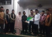 Bupati 50 Kota Serahkan Kartu BPJS Ketenagakerjaan Bagi Ribuan Pekerja Keagamaan 