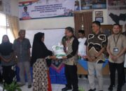 Pj. Walikota Payakumbuh Serahkan Bantuan Cadangan Beras Pemerintah Tahap III Diserahkan