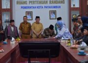 Niniak Mamak Koto Nan Ompek – Koto Nan Gadang Tandatangani Akta Perjanjian Pembangunan Kembali Pasar Blok Barat 