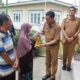 Ratusan Kepala Keluarga Di Payakumbuh Terima Bantuan Cadangan Beras Pemerintah